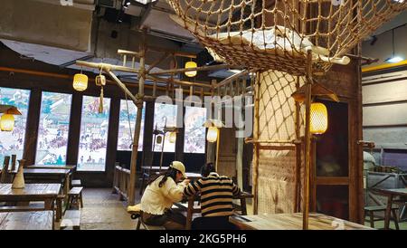 SHANGHAI, CHINA - NOVEMBER 18, 2022 - Photo taken on Nov 18, 2022 shows the reopening of 'Jianghu -- City Market', an online food street themed on cla Stock Photo