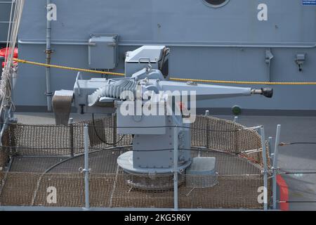 Tokyo, Japan - November 07, 2021: German Navy Rheinmetall MLG27 naval light artillery on Bayern (F217). Stock Photo