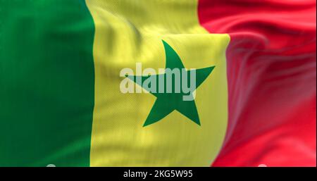 Detail of the Senegal national flag waving in the wind. The Republic of Senegal is a country in West Africa. Fabric textured background. Selective foc Stock Photo