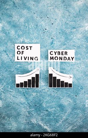 Cost of Living vs Cyber Monday conceptual image with graphs showing price going up and consumer spending going down Stock Photo