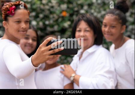 People seen posing for a selfie Stock Photo