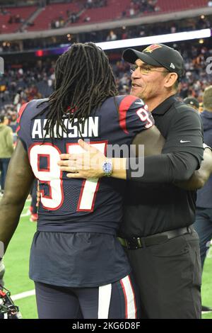 Houston Texans defensive end Mario Addison (97) and Washington Commanders head Coach Ron Rivera share a moment after the NFL Football Game between the Stock Photo