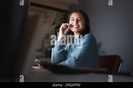Customer support, portrait and call center at night working on helping client with faq solution in digital call center. Telemarketing business, crm Stock Photo