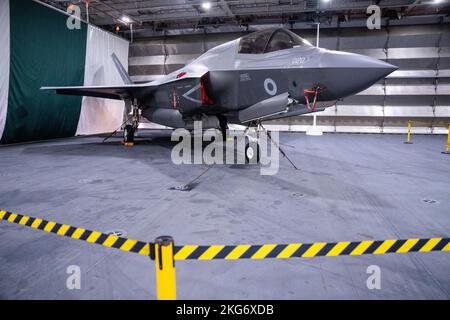 Oslo 20221121.An F-35B Lightning in the hangar on board the aircraft carrier HMS QUEEN ELIZABETH, which is on a fleet visit in Oslo. The rest of the aircraft fleet on board is behind the closed steel gate. Photo: Javad Parsa / NTB Stock Photo