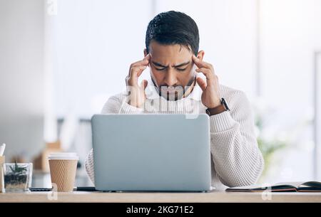 Work, stress and burnout, man at computer reading spam email, glitch or 404 error in office. Headache, frustrated at work on tax compliance and Stock Photo