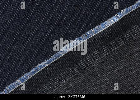 Black and grey jeans fabric textured background Stock Photo