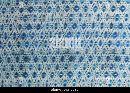 Wavy blue fabric with geometric print for sewing Stock Photo