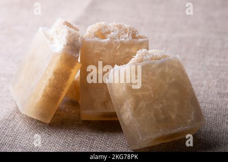 Soap with loofah sponge inside. Glycerin soaps with natural scrub. Stock Photo