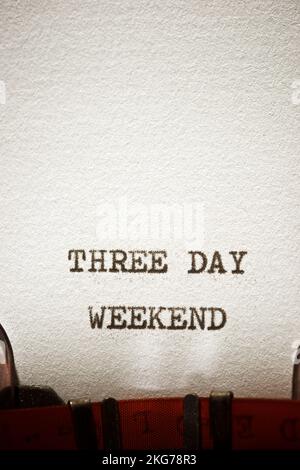 Three day weekend phrase written with a typewriter. Stock Photo