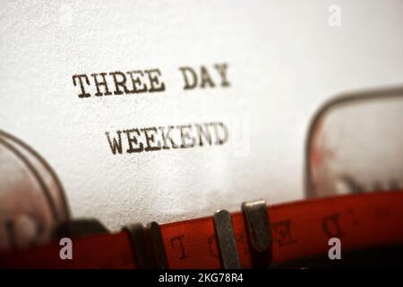 Three day weekend phrase written with a typewriter. Stock Photo