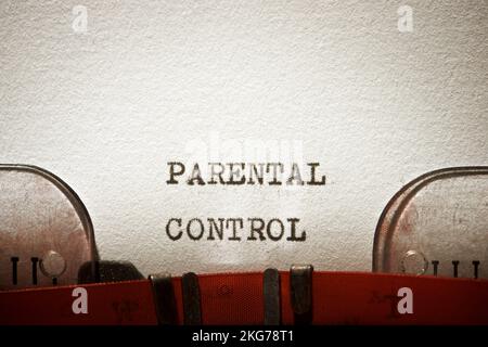 Parental control phrase written with a typewriter. Stock Photo