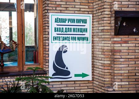 Tashkent, Uzbekistan - 31, Jctober, 2022: sign Enterence for women in mosque. Stock Photo