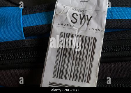 Loganair luggage label stuck on case for SYY Stornoway airport in Scotland Stock Photo