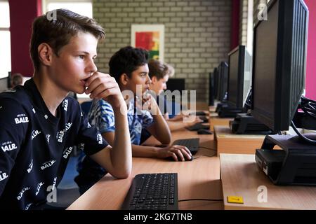 Students on a secondary school working with computer in a classroom. Holland. vvbvanbree fotografie Stock Photo