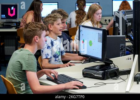 Students on a secondary school working with computers in a classroom. Holland. vvbvanbree fotografie Stock Photo
