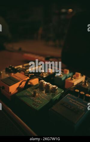 Guitar pedals standing on stage Stock Photo