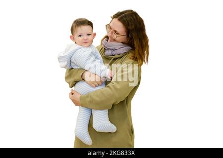 Mother woman with toddler baby boy in her arms, isolated on a white background. Mom with a child son. One year old kid Stock Photo
