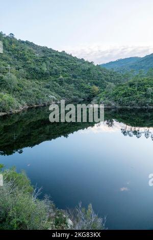 Vanadal water retention wiith clouds reflecting in the water, in la Garde-Freinet,in Massif des Maures,  in South of France, in Europe, in Provence. Stock Photo