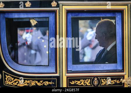 Westminster, London, UK. 22nd Nov, 2022. HM Camilla, the Queen Consort, rides in a carriage with HM King Charles III and Cyril Ramaphosa, President of South Africa. Members of the Royal Family, including the King and Queen Consort, and Prince and Princess of Wales, together with the President of South Africa, Cyril Ramaphosa, ride in carriages along the Mall to Buckingham Palace, for the State Visit of President Ramaphosa. They are accompanied by the Kings' Troop and military bands for the occasion. Credit: Imageplotter/Alamy Live News Stock Photo