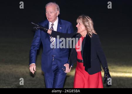 United States President Joe Biden and first lady Dr. Jill Biden walk on the South Lawn of the White House in Washington, DC on November 21, 2022, after a trip to Cherry Point, North Carolina, where they participated in a Friendsgiving dinner with service members and military families.Credit: Oliver Contreras / Pool via CNP /MediaPunch Stock Photo