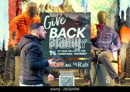 Glasgow, Scotland, UK 22nd November, 2022. Black Friday shopping saw shop adverts and shopping bags on Buchanan street the style mile and shopping capital of Scotland. Credit Gerard Ferry/Alamy Live News Stock Photo