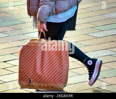 Glasgow, Scotland, UK 22nd November, 2022. Black Friday shopping saw shop adverts and shopping bags on Buchanan street the style mile and shopping capital of Scotland. Credit Gerard Ferry/Alamy Live News Stock Photo