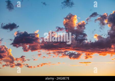 Sky with purple clouds at sunset Stock Photo