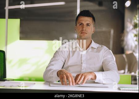 Visually impaired office worker reading by touch Stock Photo