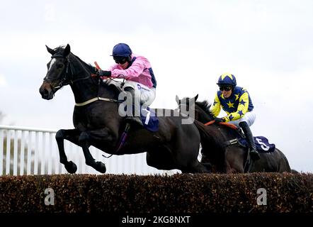 Our Bill's Aunt ridden by jockey Kielan Woods (left) and Supreme Yeats ridden by jockey Patrick Cowley compete in the Follow @Vickersracing on Twitter Novices' Handicap Hurdle at Southwell Racecourse. Picture date: Tuesday November 22, 2022. Stock Photo