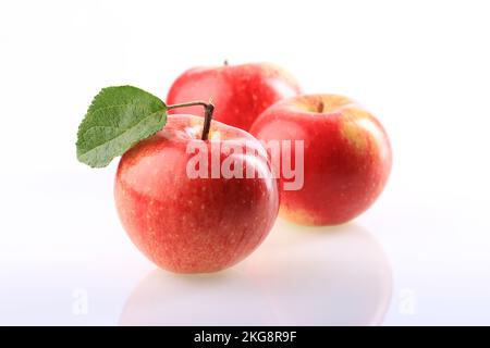 group of three apples on white background Stock Photo