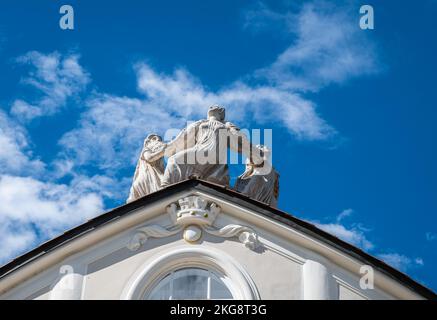 Merano (Meran) city: Details of the statue  of dancing graces on the top of famous building Kurhaus,  South Tyrol, Trentino Alto Adige, northern Italy Stock Photo