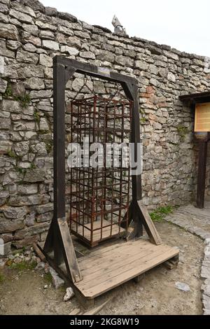 Checiny, Poland - September 14, 2022: Old cage in Checiny Castle - a royal castle from the turn of the 13th and 14th centuries. Poland Stock Photo