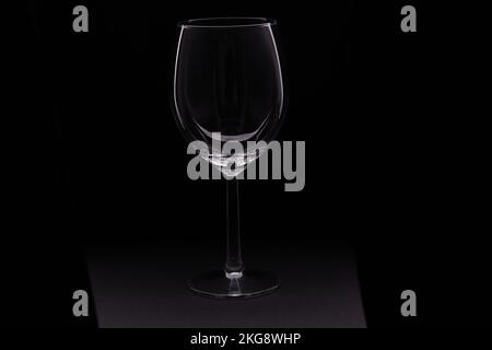 photo of an empty wine glass on a black background Stock Photo
