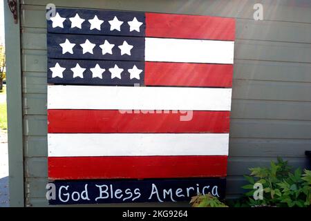 Artistically painted American flag on the side wall of a garage. Fergus Falls Minnesota MN USA Stock Photo