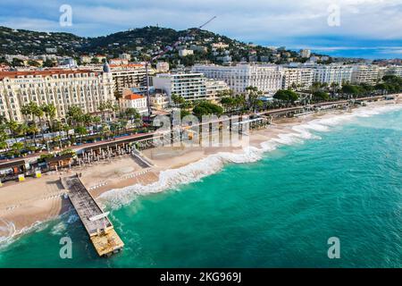 Aerial fly above La croisette Cannes on the French Riviera on the Mediterranean Sea. The location for the world Famous Cannes Film Festival Stock Photo