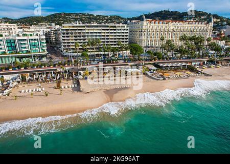 Aerial fly above La croisette Cannes on the French Riviera on the Mediterranean Sea. The location for the world Famous Cannes Film Festival Stock Photo