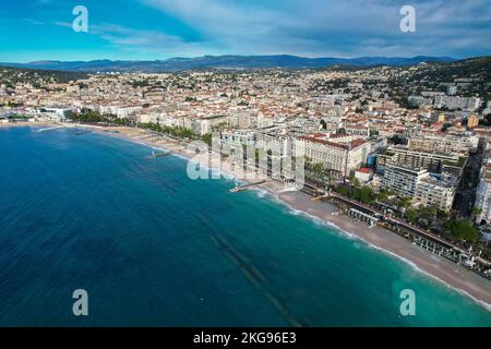 Aerial fly above La croisette Cannes on the French Riviera on the Mediterranean Sea. The location for the world Famous Cannes Film Festival Stock Photo