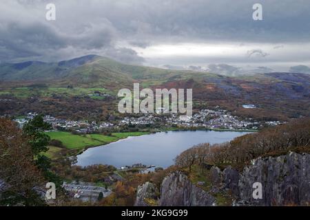 Llanberis is a village in North Wales here seen from the Padarn Country Park at the top of the Vivian Slate Quarry. Stock Photo