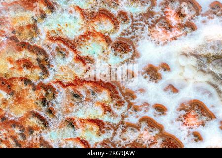 Quartz stone with gray and brown patterns. Background and texture of natural quartzite. Stock Photo