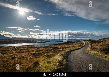 A bright, autumnal HDR image of Cul More, Suilven and Canisp with Badcall bay in the foreground, Assynt, Sutherland, Scotland. 26 October 2022 Stock Photo