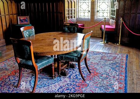 A view of the grand dining room with big, huge fireplace. At Cardiff Castle in Cardiff, Wales, United Kingdom- 16th of October 2022 Stock Photo