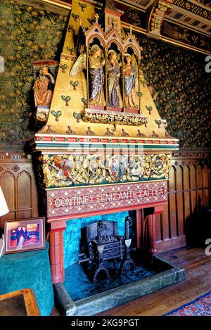 A view of the grand dining room with big, huge fireplace. At Cardiff Castle in Cardiff, Wales, United Kingdom- 16th of October 2022 Stock Photo
