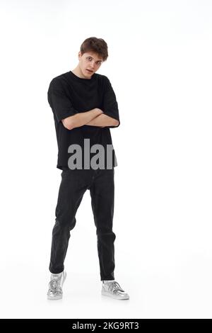 young man in black t-shirt and jeans dancing Stock Photo