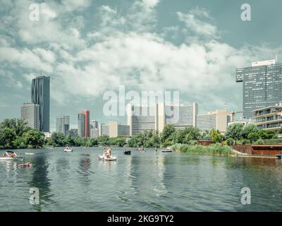 Vienna, Austria - June 2022: View from Kaiserwasser Alte Donau park with the building complex hosting the United Nations Office at Vienna Stock Photo