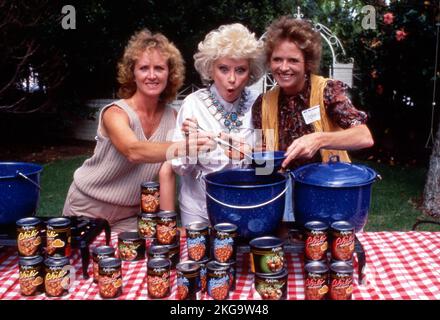 Phyllis Diller with her daughters promoting her new line of food September 15, 1987.  Credit: Ralph Dominguez/MediaPunch Stock Photo