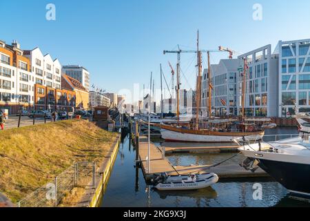 Gdansk, Poland - 11 March, 2022: Ships sailing on Motlawa river Stock Photo