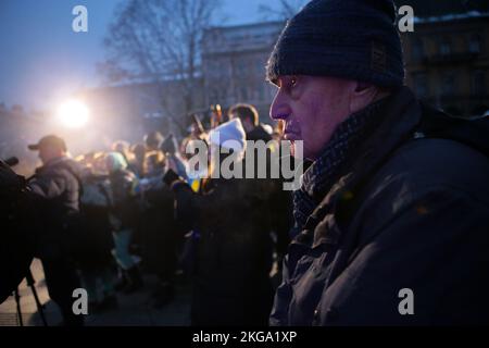 LVIV, UKRAINE - NOVEMBER 21, 2022 - Participants of the Maidan Reminiscences art event on the Dignity and Freedom Day and the 9th anniversary since the beginning of the Revolution of Dignity on the square at the Taras Shevchenko monument, Lviv, western Ukraine. Stock Photo