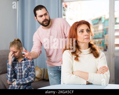 The son-in-law makes claims to the mother-in-law Stock Photo