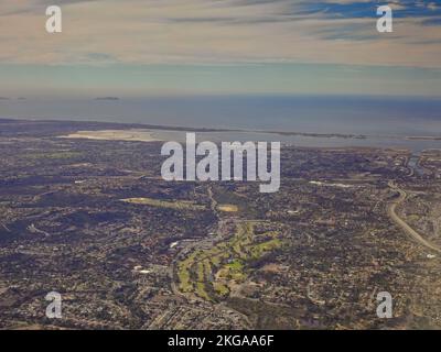 San Diego, CA., USA 11th November, 2022       Aerial view of the south part of San Diego looking towards Chula Vista and itÕs golf course (bottom centre)  and beyond to Silver Strand Beach and the border with Mexico at Tijuana(left) Stock Photo