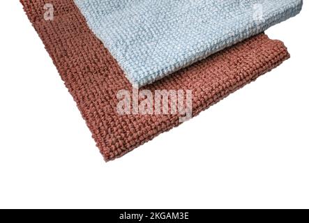Brown and blue microfiber fabric, highlighted on a white background. New soft microfiber material for cleaning objects and surfaces. Isolated on a whi Stock Photo